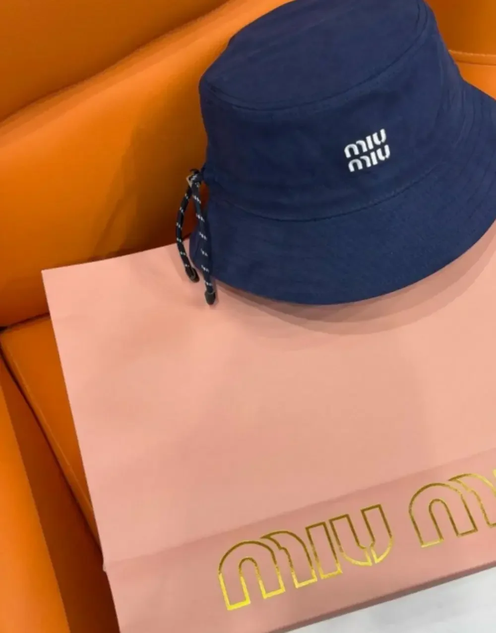 Miu Miu Navy Blue Logo Embroidered Bucket Hat with Drawstring